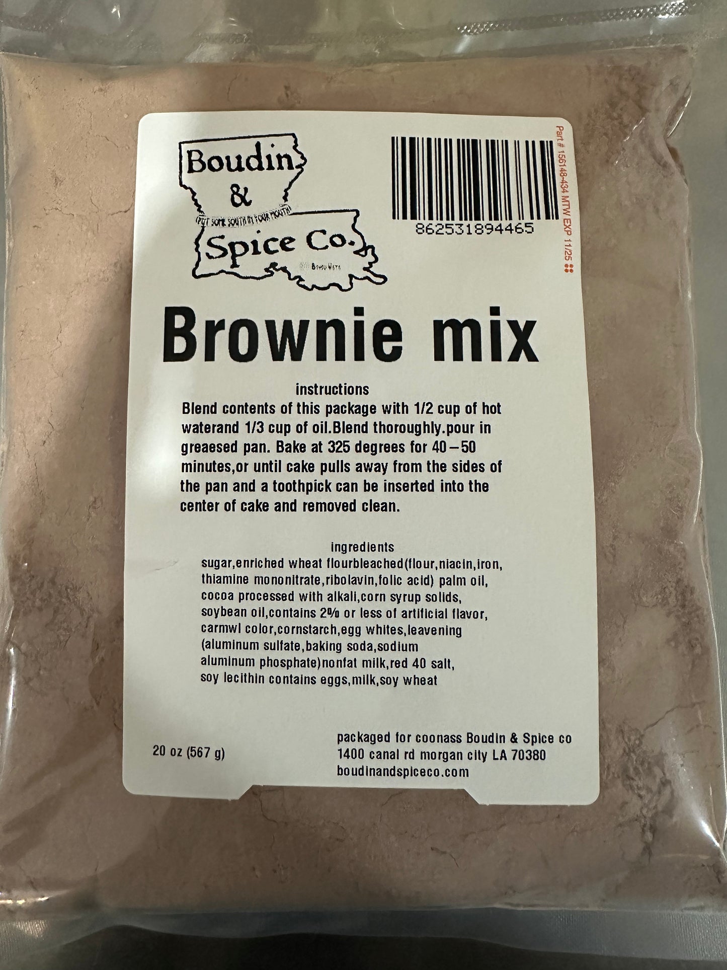 A package of Boudin & Spice Co. Brownie mix with visible ingredients such as sugar, vegetable oil, and eggs listed on the front.