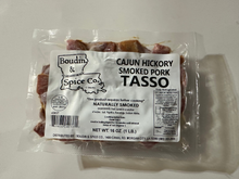 Packaged smoked pork tasso with Boudin & Spice Co. label on a white background